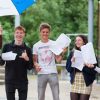 students celebrating exam result success
