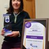 Healthy Homes Project Manager Tara Bowers with ECOE’s Energy Efficiency Award