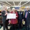 Dan Salisbury, customer service manager at the Exeter Vale Tesco Extra, presents a cheque for £4,000 to Pete’s Dragons chair of trustees Janet Ash. Also pictured are Tesco’s Marta Marsweska and John Smith.