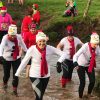 People running across a river