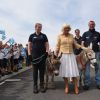 HRH Duchess of Cornwall meets donkeys called William and Harr.  Photo: The Donkey Sanctuary 