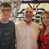 Head of History Giles Trelawny with his twin son and daughter on A Level results day 2019 