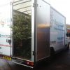 Hospiscare van being loaded with Christmas Trees 