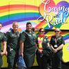SW Ambulance Service NHS Foundation Trust staff and a brightly-coloured ambulance. Photo: Alan Quick