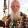 Folk Festival enthusiast Nigel with his many badges. Photo: Alan Quick. 