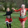 People running at Escot in fancy dress