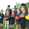 Children from Trinity C of E Primary School are pictured with (L-R) Senior Mace Sergeant John Davies; Dominic Goodhew, CITY Community Trust PL Primary Stars coach; and the new Lord Mayor of Exeter Cllr Peter Holland