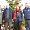 People and christmas tree