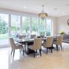 A living room filled with furniture and a large bi fold door