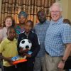 The Farries with the family of their sponsored child in Tanzania. November 2018 