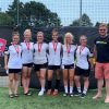 Plympton A were runners-up in the Exeter City FC One Game One Community Group community diversity football tournament, with Simon Kitchen from ECFC OGOC group, right. Photo: Alan Quick