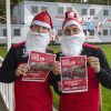 Exeter City FC first team players Matt Jay and Pierce Sweeney take time out of their training schedule to help promote the CITY Community Trust Santa Run