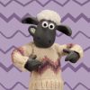 Shaun the sheep wearing a knitted jumper