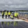 Team members from Summerfield and Devon Contractors on the roof of Westpark 26 Business Park in Well