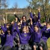 happy pupils in purple uniform celebrating St Sidwells School Exeter ousted report