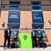 Four Wilson partners stood outside building