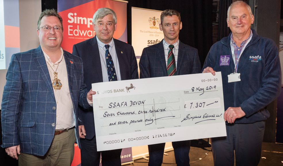 Lord Mayor of Exeter, Councillor Rob Hannaford, John Coombs and Jean-Paul Quertier, partners at Simpkins Edwards, presenting Brigadier Andy Pillar OBE and Chairman of SSFA, Devon Branch with a Really Big Quiz cheque for over £7,000