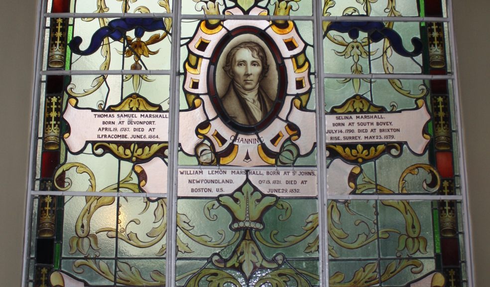 A stain glass window in remembrance of the Marshall family.