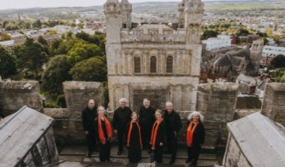 Some members of the 75 person chorus on the roof of Exeter Cathedral. Image: Matt Austin