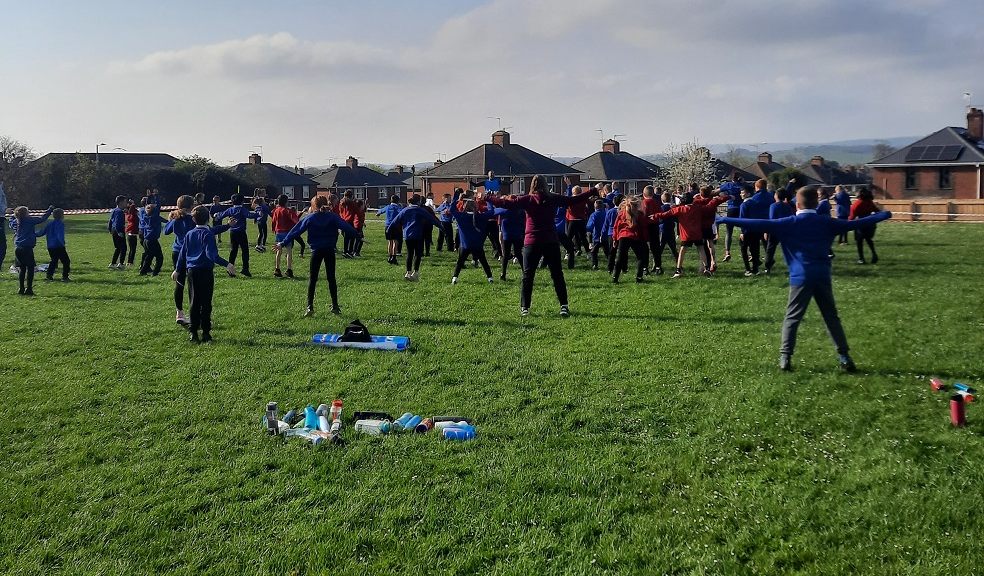 Warming up for the Wynstream School fun run for FORCE cancer Charity