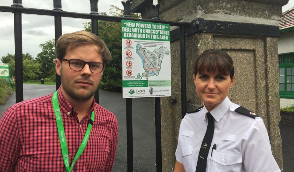 Supt Sam De Reya (right) with Cllr Stephen Brimble, Lead Councillor for Place, in front of one of the PSPO signs. Image: Exeter City Council.