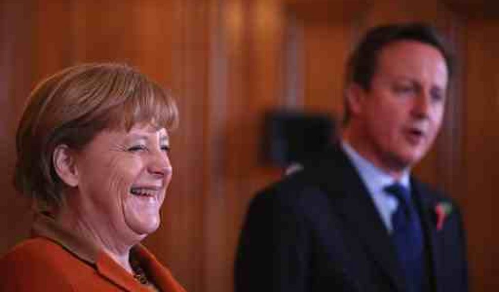 German Chancellor Angela Merkel and Britain's Prime Minister David Cameron speak to the press ahead of a bilateral meeting at 10 Downing Street, London, Wednesday, Nov. 7, 2012. (AP Photo /Dan Kitwood/ Pool)