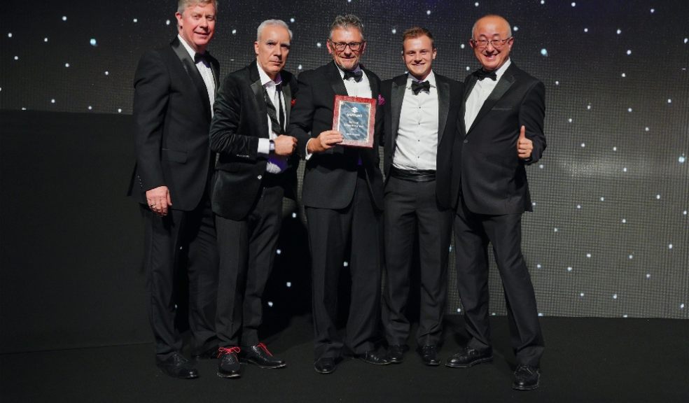 The team from Tracks of Exeter collecting their awards.