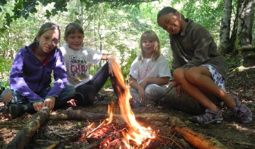 Children having fun in the woods