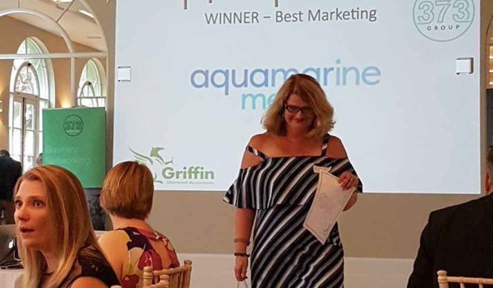 Alona Kemmett collecting award