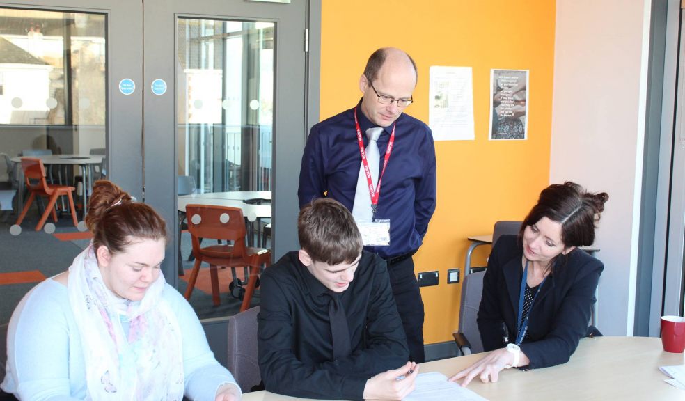 Sixth formers Lottie Purcell (18) and Marshall Tozer (16) receive advice on interview skills from Pete Adams, Head of Customer Services, Valeport.