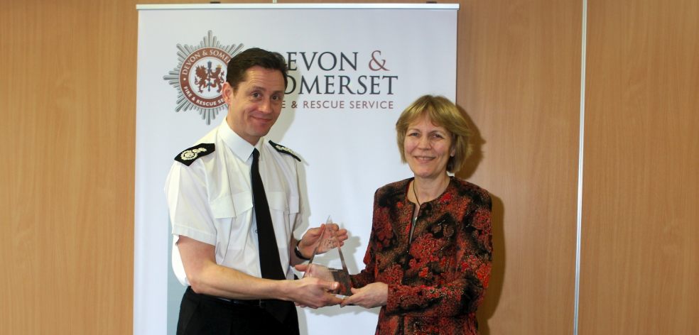 Chief Fire Officer Lee Howell receiving the award from Frances Richardson, Director of Operations, RoSPA