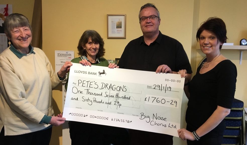 (l-r) Prue Tasman, Judy Day and Colin Rea of the Big Noise Chorus present a cheque for £1,760 to Pete’s Dragons Project Manager Kate Bedding. 