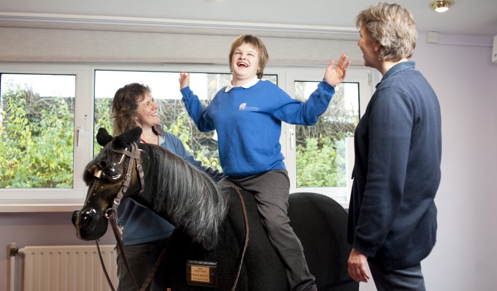 WESC Student Bethany (centre) on ‘Black Beauty’ with therapists Kayan Gardner (left) and Nicky Groucutt (right)