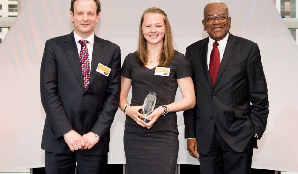 Brittany Harris received the Undergraduate of the Year 2014 Award from Sir Trevor McDonald OBE at a ceremony in Canary Wharf, London