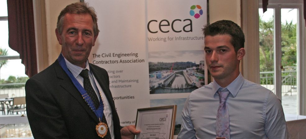Sam Atwill (right) being presented with his award by CECA South West’s Chairman Greg Adamiw