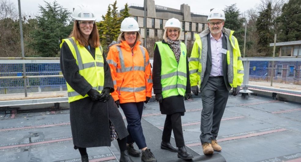 Topping out ceremony for the Centre for Resilience in Environment, Water and Waste (CREWW) at the University of Exeter's Streatham Campus with Vice-Chancellor Lisa Roberts, Susan Davy from South West Water, Dave Chudley from Morgan Sindall and Alex Herbert-Guest from Research England. Photo by Theo Moye.