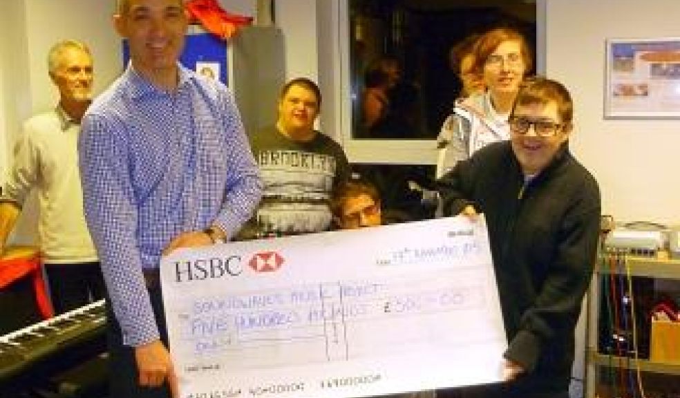 William Flint presenting the £500 Cheque to Soundwaves Music