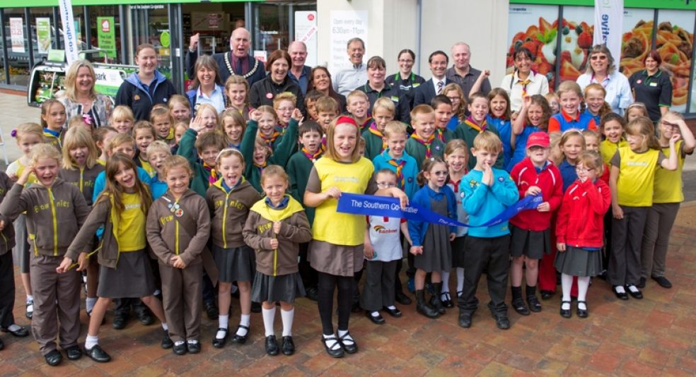 The community celebrate the opening of the first shop in Cranbrook in September 2015