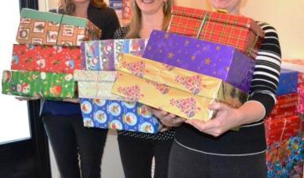 From left to right Clare Aryeetey, Amy Jeffery and Alex Jones – this is just a small number of the boxes dropped in.