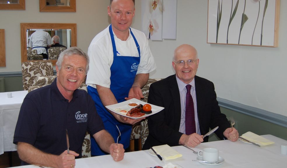 Steve Mabbutt (centre, St Olaves chef) dishes up a Great Devon Breakfast for Peter Payne (FORCE Cancer Charity) and Philip Luckham (Gilbert Stephens) Photo credit: Attention Media