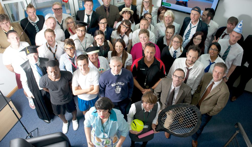 Staff at Exeter-based EMCAS get 'Back to School' to raise money for charity.