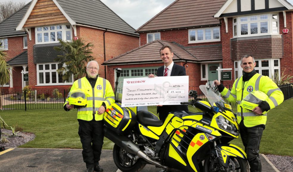 Andrew Addison, Sales Director at Redrow West Country, pictured with the Devon Free Wheelers