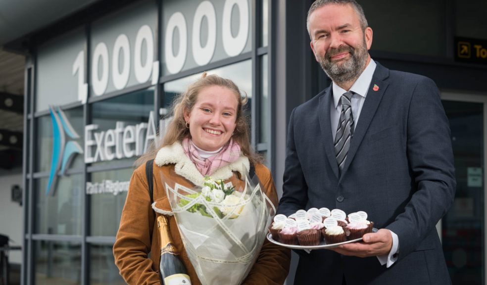 Exeter Airport managing director Matt Roach with millionth passenger Lily Harris.