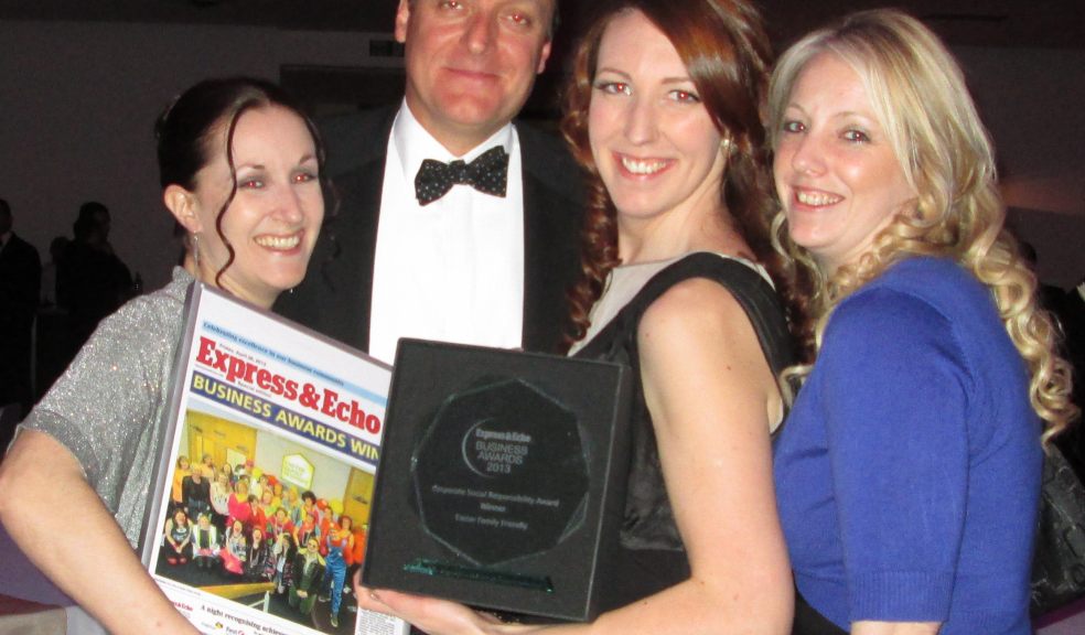 Exeter Family's Community & Charity team celebrate with the award