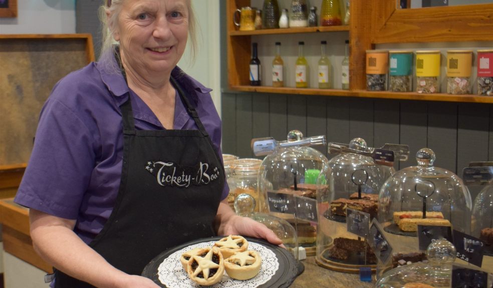 Woman with mince pies