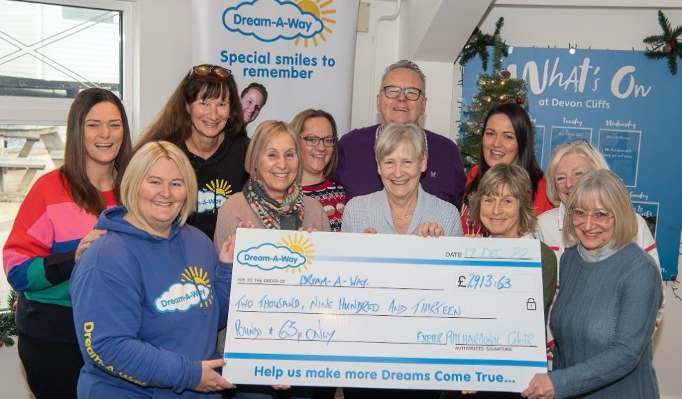 Exeter Philharmonic Choir members present a cheque for donations raised from December carol concerts to local charity Dream-A-Way. Photo: Maxy Maxwell Photography)