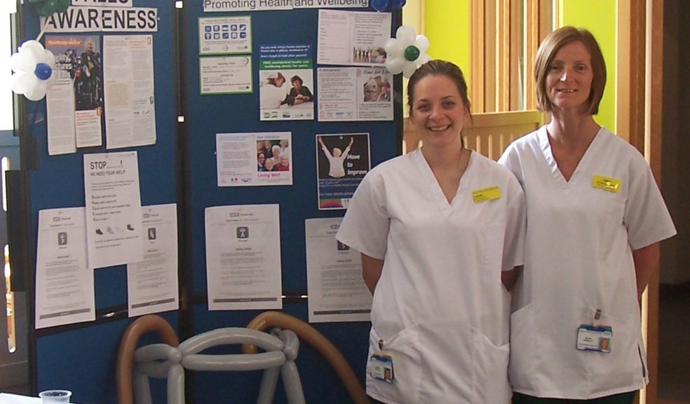 Physiotherapist Lauren Worley (left) and occupational therapist Helen Wamsley, from the Onward Care Service, are pictured next to the falls awareness and prevention stand at RD&E.