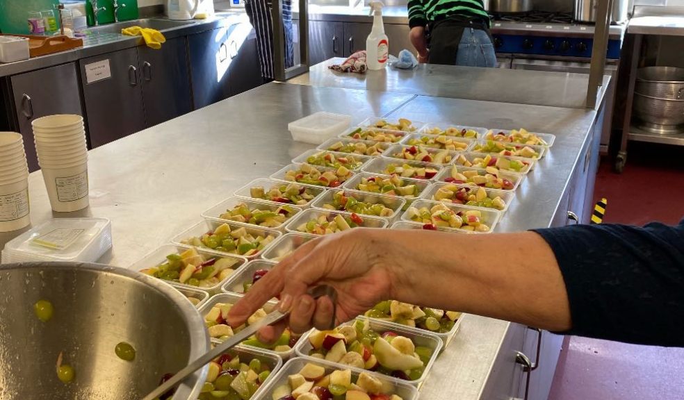 Fruit salad being prepared by FoodCycle Exeter The Lord Mayor of Exeter Visits FoodCycle Exeter