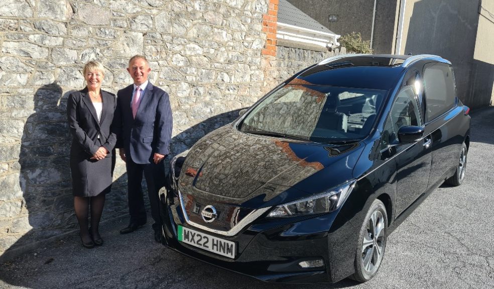 Funeral Partners Area Development Manager Sandra Murphy with Malcolm Brooks from Wilcox Limousines.