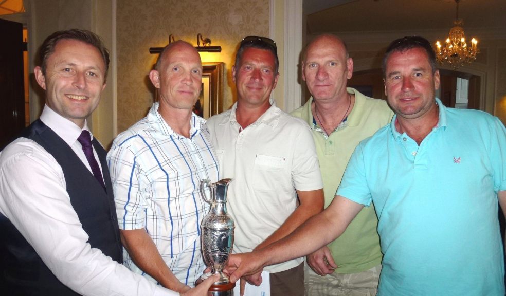 Pictured are John Burgoyne of Burgoyne Estate Agents and the winning team Acorus